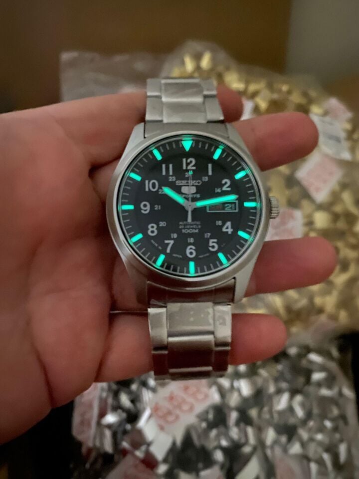 Seiko 5 Japan SNZG13J1 Otomatik Çelik Gri Siyah Kadran 10 ATM 42 mm Nato Kordon Hediyeli Erkek Kol Saati